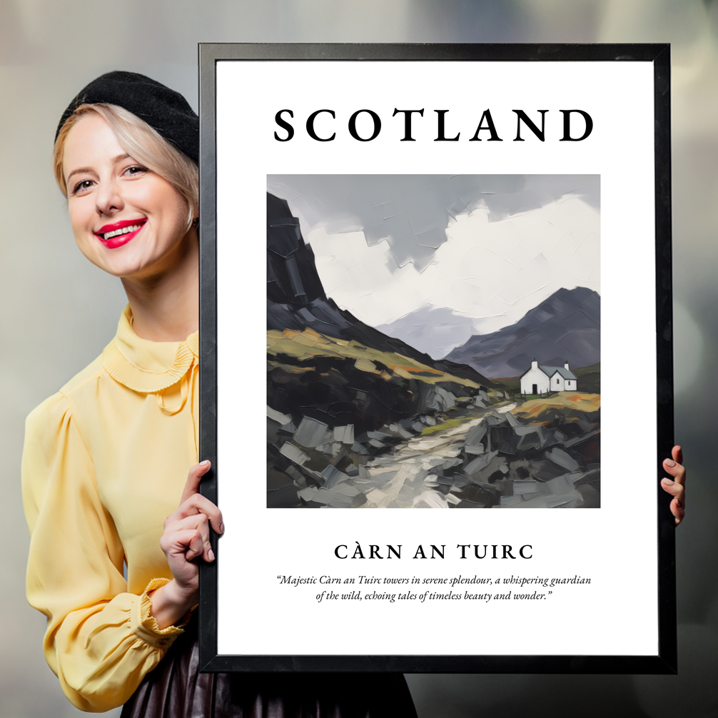 Person holding a poster of Càrn an Tuirc